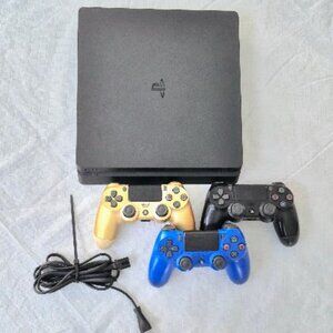 PS4 Console - With 3 controlers and cable.